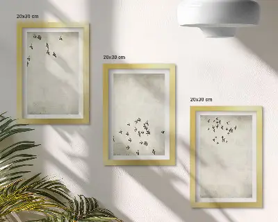 Set van ingelijste schilderijen met een minimalistische afbeelding van vliegende vogels