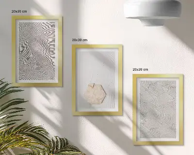 Set ingelijste schilderijen lichte texturen op het zand in delicate boho-stijl