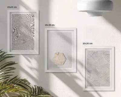 Set ingelijste schilderijen lichte texturen op het zand in delicate boho-stijl