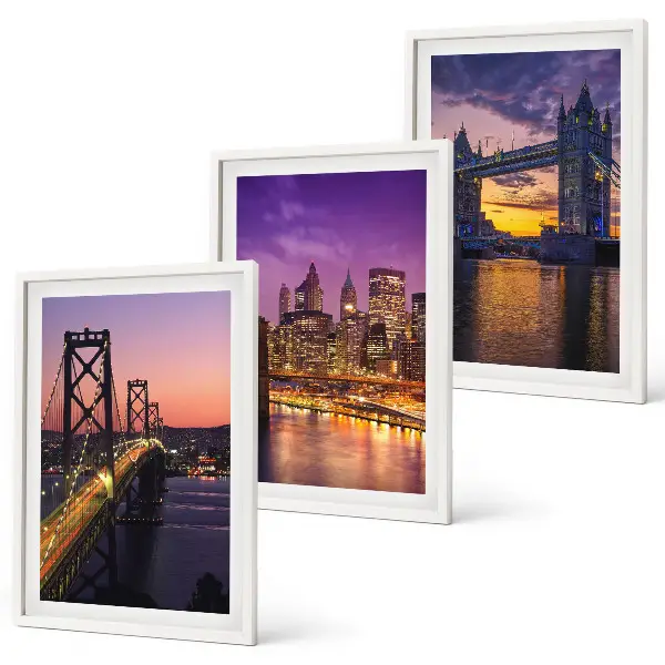 Wanddecoratie set schilderijen met uitzicht op een stad met bruggen en zon