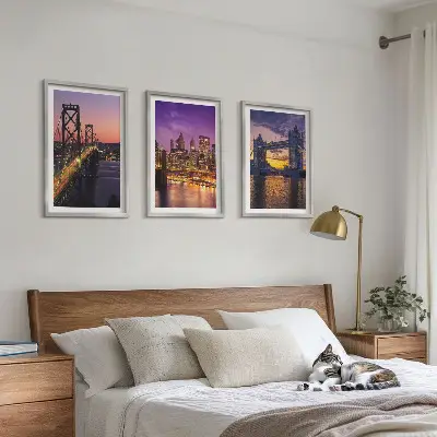 Wanddecoratie set schilderijen met uitzicht op een stad met bruggen en zon