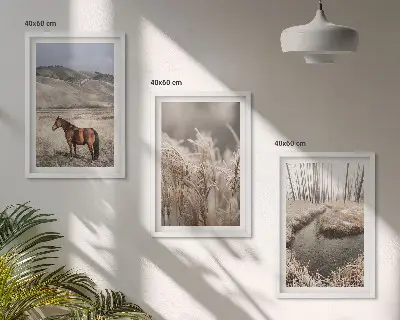 Fotowand met een landschap van paarden in het gras bij een beek