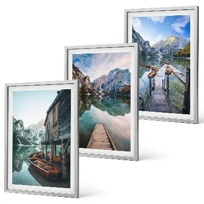 Fotowand met afbeelding van zee, bergen en houten boten
