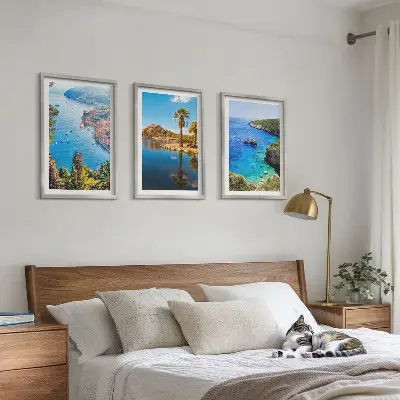 Wanddecoratie set schilderijen met afbeelding van palmen aan de blauwe kust