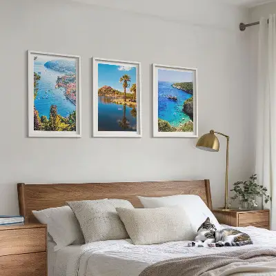Wanddecoratie set schilderijen met afbeelding van palmen aan de blauwe kust
