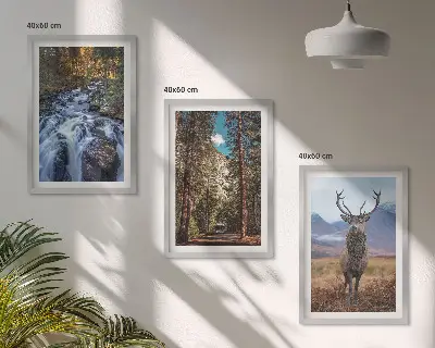 Fotowand met een waterval in een bos met bergen en een hert in de natuur