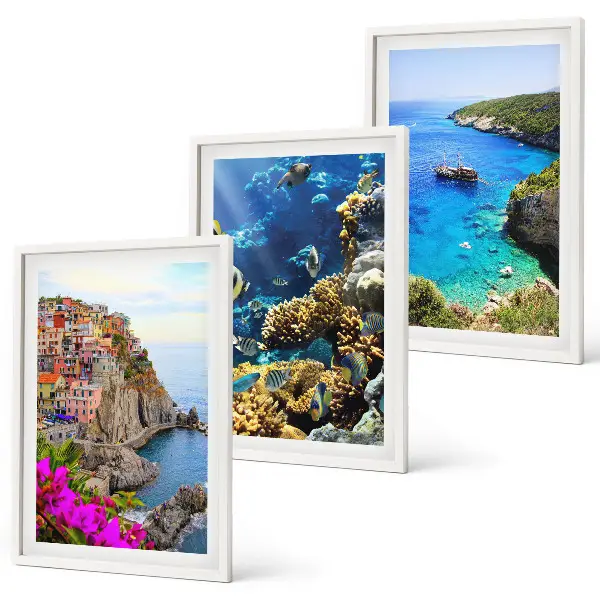 Set wanddecoratie met schilderijen kustlandschap met kleurrijke huizen