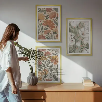 Set schilderijen voor wanddecoratie met oranje en groene bloemmotieven