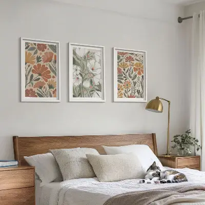 Set schilderijen voor wanddecoratie met oranje en groene bloemmotieven