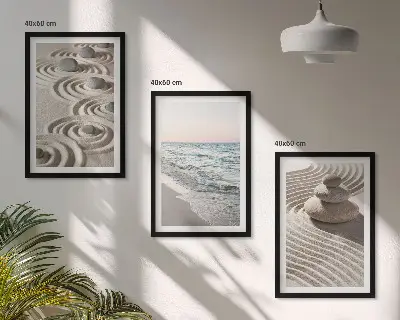 Fotowand met zandgolven, water en stenen op het strand