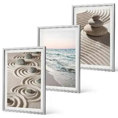 Fotowand met zandgolven, water en stenen op het strand