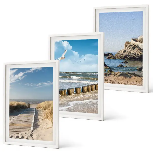 Set wanddecoratie met schilderijen houten strandpad bij de kliffen