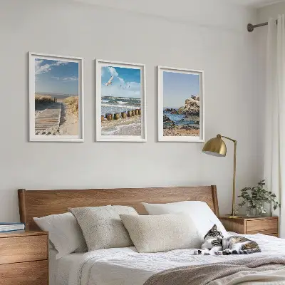 Set wanddecoratie met schilderijen houten strandpad bij de kliffen