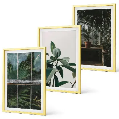 Wanddecoratieset schilderijen groene bladeren bij een raam met planten