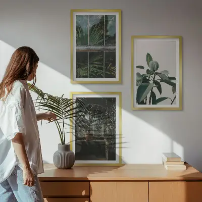 Wanddecoratieset schilderijen groene bladeren bij een raam met planten