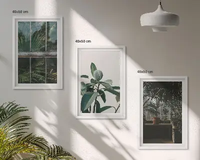 Wanddecoratieset schilderijen groene bladeren bij een raam met planten