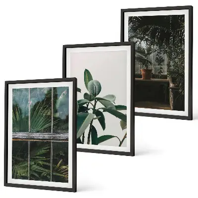 Wanddecoratieset schilderijen groene bladeren bij een raam met planten