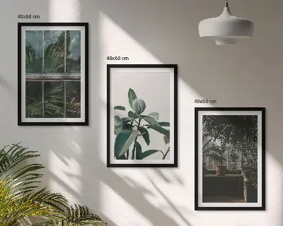 Wanddecoratieset schilderijen groene bladeren bij een raam met planten