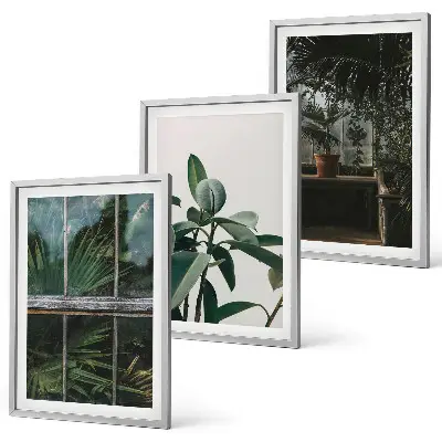 Wanddecoratieset schilderijen groene bladeren bij een raam met planten