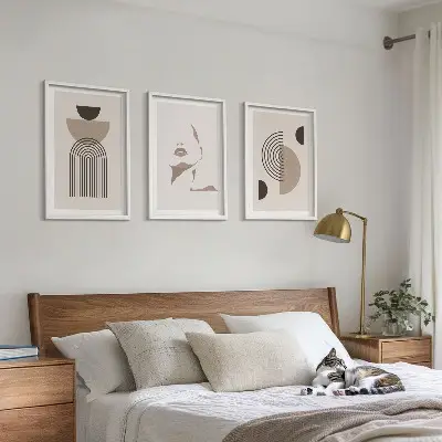 Fotowand met abstracte vormen en een gezicht