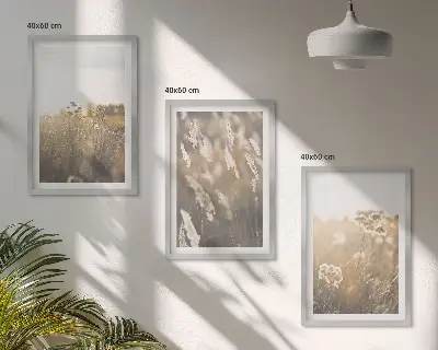 Fotowand landschap met gras en bloemen in warme tinten