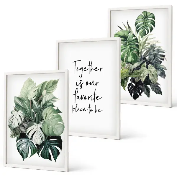 Set wanddecoratie met schilderijen met tropische groene bladeren