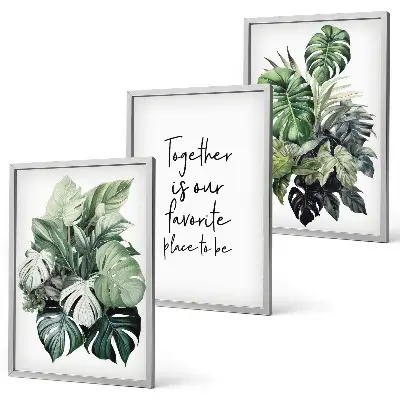 Set wanddecoratie met schilderijen met tropische groene bladeren