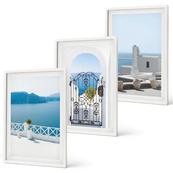 Wanddecoratieset schilderijen met afbeelding van witte gebouwen aan de zee in Griekenland