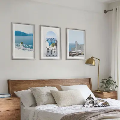 Wanddecoratieset schilderijen met afbeelding van witte gebouwen aan de zee in Griekenland