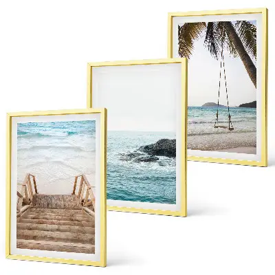 Wanddecoratieset schilderijen met een trap bij het strand en een schommel aan de zee