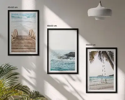 Wanddecoratieset schilderijen met een trap bij het strand en een schommel aan de zee