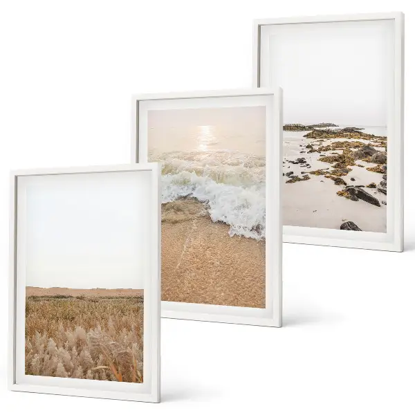 Wanddecoratieset schilderijen met strand, golven en stenen in de zomer