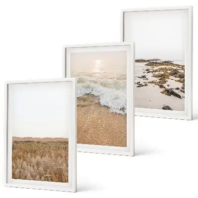 Wanddecoratieset schilderijen met strand, golven en stenen in de zomer