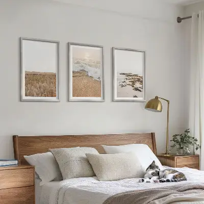 Wanddecoratieset schilderijen met strand, golven en stenen in de zomer