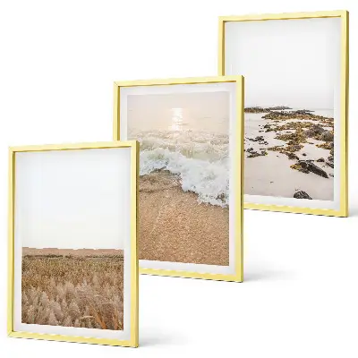 Wanddecoratieset schilderijen met strand, golven en stenen in de zomer