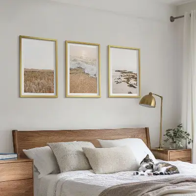Wanddecoratieset schilderijen met strand, golven en stenen in de zomer