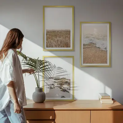 Wanddecoratieset schilderijen met strand, golven en stenen in de zomer