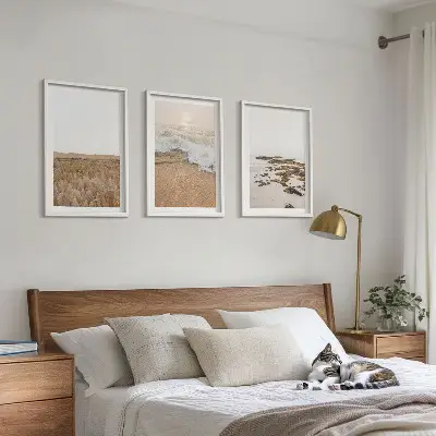 Wanddecoratieset schilderijen met strand, golven en stenen in de zomer