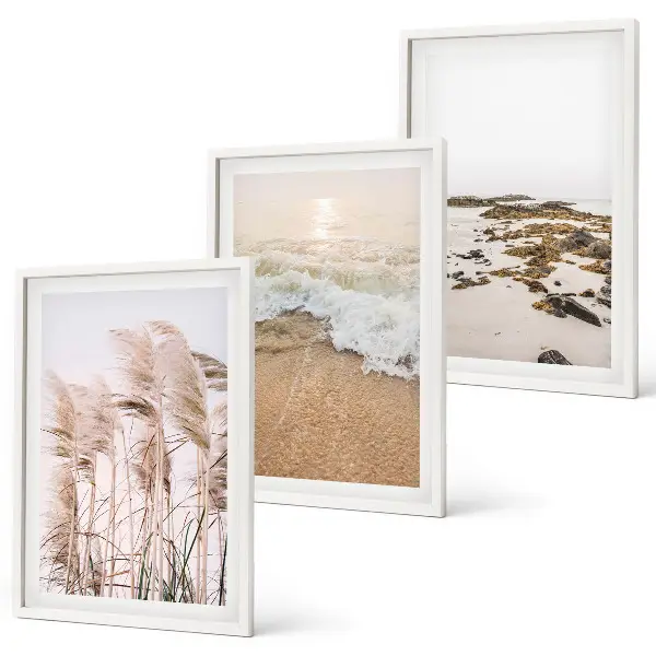 Wanddecoratieset schilderijen met strand gras golven en stenen in boho stijl