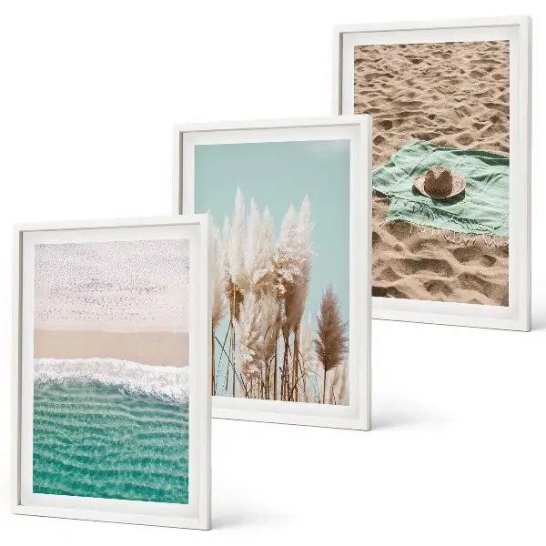 Wanddecoratieset schilderijen met strand, golven, gras en hoed