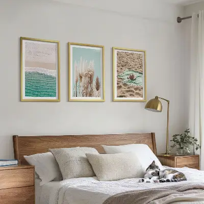 Wanddecoratieset schilderijen met strand, golven, gras en hoed