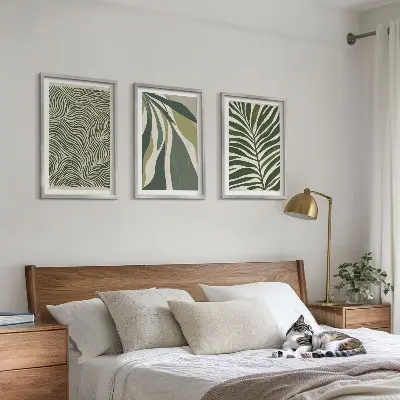Wanddecoratie set schilderijen met golvende lijnen in groentinten