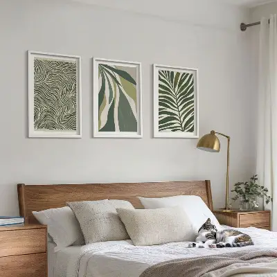 Wanddecoratie set schilderijen met golvende lijnen in groentinten