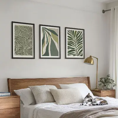 Wanddecoratie set schilderijen met golvende lijnen in groentinten