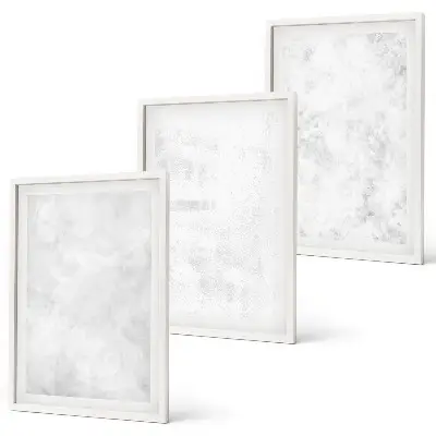 Wanddecoratieset schilderijen met minimalistische witte vlekken op een achtergrond