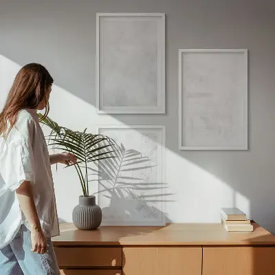 Wanddecoratieset schilderijen met minimalistische witte vlekken op een achtergrond
