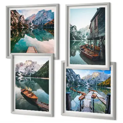 Set van posters met lijst met afbeelding van meer, bergen, boten en een huisje