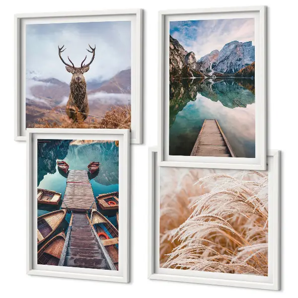 Set posters met lijst boten op het meer met herten en bergen