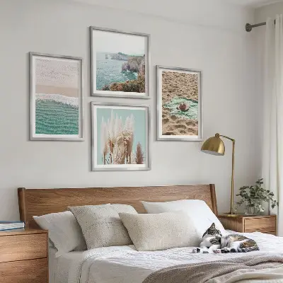 Posterset met lijsten strandgolven met gras en een hoed