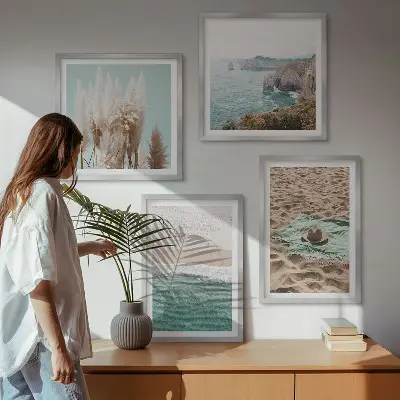 Posterset met lijsten strandgolven met gras en een hoed